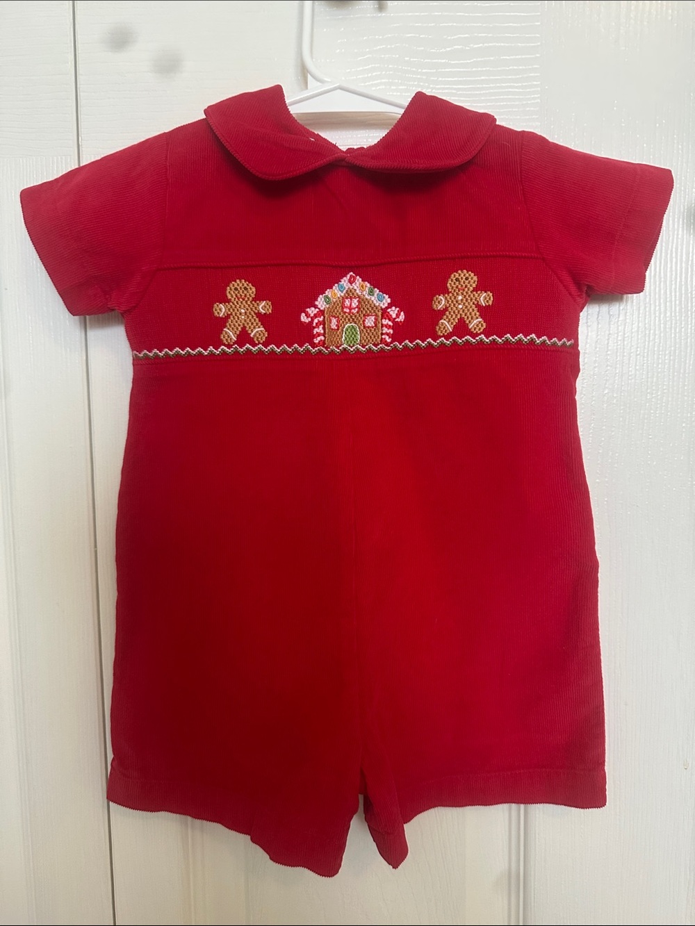 Petit Bebe 9M Corduroy Jon Jon with Gingerbread House Smocking; 17” long